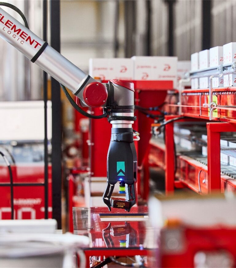 robotic each picking unit grabs a piece of product for an order